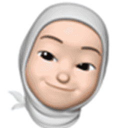 A participant wearing a pale headscarf